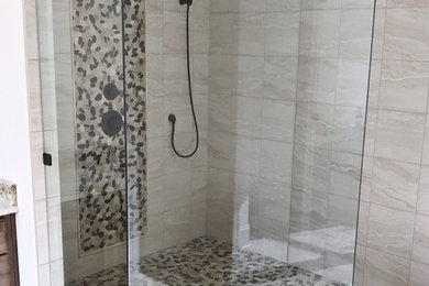 Example of a large transitional master bathroom design in Other