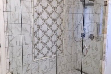 Example of a large transitional master gray tile and ceramic tile ceramic tile and white floor alcove shower design in Other with white walls and a hinged shower door