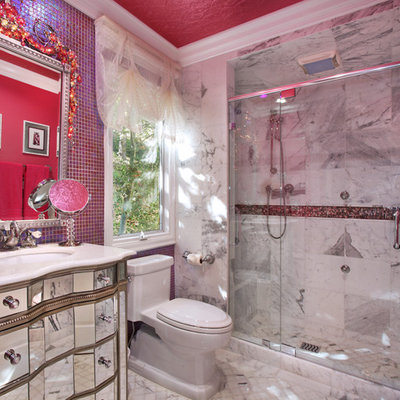 Example of an eclectic bathroom design in Orange County with furniture-like cabinets