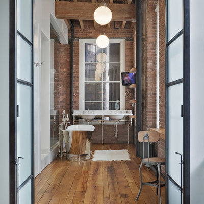 Large urban master red tile medium tone wood floor and brown floor bathroom photo in New York with marble countertops, a console sink, red walls, open cabinets and medium tone wood cabinets