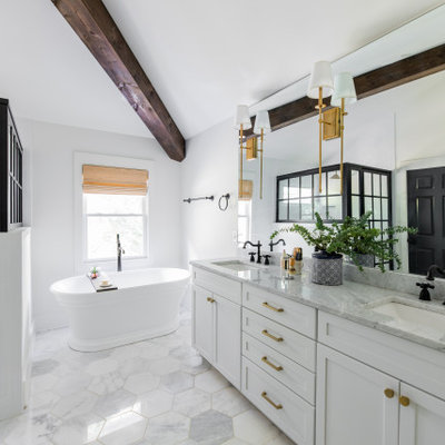 Bathroom - large country master white floor bathroom idea in Nashville with shaker cabinets, white cabinets, white walls, an undermount sink, a hinged shower door and gray countertops