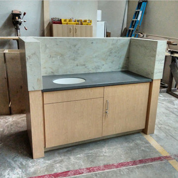 Free standing corian sink/cabinet