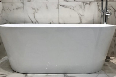 Freestanding Bath with Marble effect Porcelain tiling