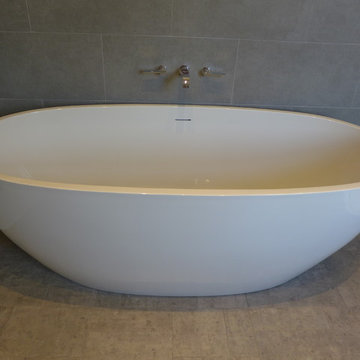 freestanding bath with wall mounted taps