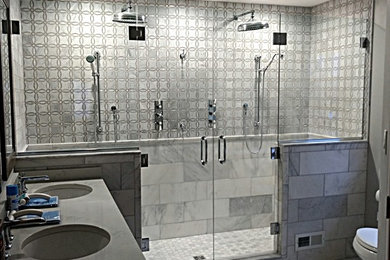 Example of a bathroom design in Wilmington with a hinged shower door