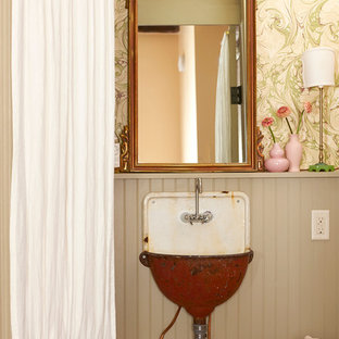 Inspiration for a shabby-chic style bathroom in New Orleans with a wall-mount sink and multi-coloured walls.