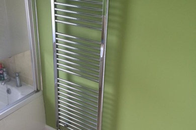 Freshly painted wall and radiator installed