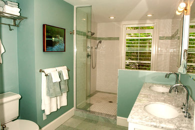 Photo of a medium sized traditional ensuite bathroom in Boston with a submerged sink, open cabinets, white cabinets, marble worktops, a built-in bath, a walk-in shower, a two-piece toilet, white tiles, ceramic tiles, green walls and ceramic flooring.