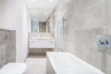 This is an example of a medium sized contemporary bathroom in London.