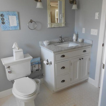 Full Bathroom with Adjacent Laundry Room