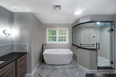 Example of a transitional bathroom design in Manchester