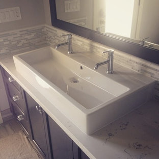 Large transitional master bathroom in Boston with recessed-panel cabinets, dark wood cabinets, gray tile, white tile, matchstick tile, white walls, plywood floors, a trough sink, quartzite benchtops and an alcove shower.
