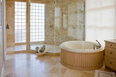 Bathroom - large traditional master beige tile, blue tile and stone tile travertine floor and beige floor bathroom idea in San Diego with recessed-panel cabinets, light wood cabinets, white walls, an undermount sink, soapstone countertops and a hinged shower door