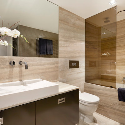 Inspiration for a contemporary brown tile bathroom remodel in Melbourne with flat-panel cabinets, black cabinets, a one-piece toilet and an integrated sink