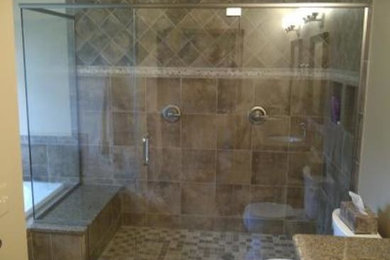 Example of a large master bathroom design in Detroit with beige walls