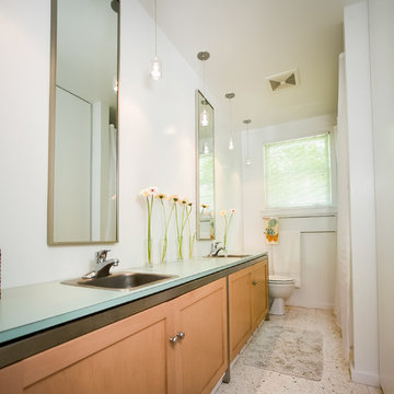 Galley Style Bathroom with His and Her Sinks