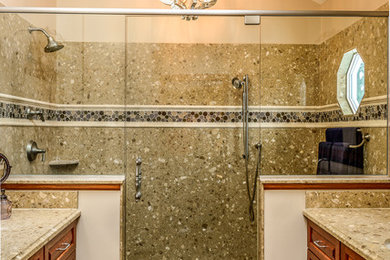 Inspiration for a mid-sized timeless master multicolored tile and glass tile porcelain tile double shower remodel in Chicago with an undermount sink, raised-panel cabinets, medium tone wood cabinets, quartz countertops, a two-piece toilet and beige walls