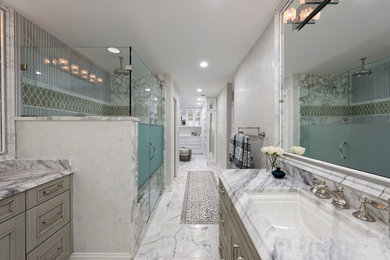 Example of a large transitional master gray tile and mosaic tile marble floor and white floor bathroom design in DC Metro with shaker cabinets, gray cabinets, a bidet, gray walls, an undermount sink and marble countertops