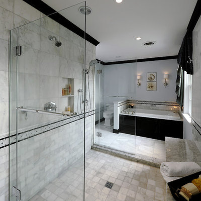 Bathroom - large traditional master subway tile, gray tile and white tile marble floor and gray floor bathroom idea in DC Metro with flat-panel cabinets, black cabinets, a two-piece toilet, gray walls and marble countertops