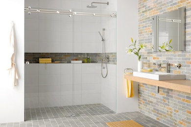Bathroom - mid-sized contemporary master gray tile and yellow tile cement tile floor and gray floor bathroom idea in Miami with a vessel sink and wood countertops