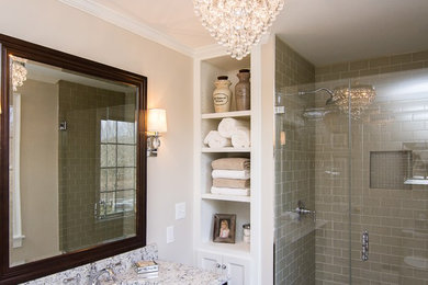 Example of a mid-sized transitional 3/4 porcelain tile and beige floor bathroom design in Boston with raised-panel cabinets, dark wood cabinets, a two-piece toilet, beige walls, an undermount sink, granite countertops and a hinged shower door
