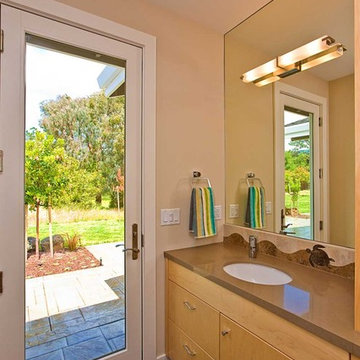 Glass door from bathroom leads to pool