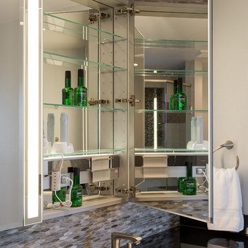 Glass medicine cabinets with inline lighting