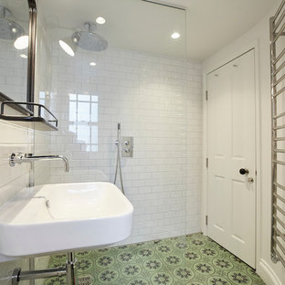 Inspiration for a small classic bathroom in London with a wall mounted toilet, white tiles, metro tiles, a wall-mounted sink, marble worktops, an open shower, white worktops, ceramic flooring and multi-coloured floors.