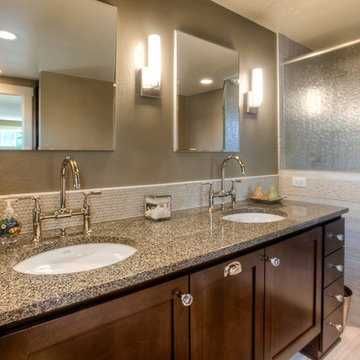 Gorgeous Bathroom with High End Finishes and Featuring a Corner Shower with His