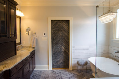 Inspiration for a master ceramic tile and gray floor freestanding bathtub remodel with gray walls