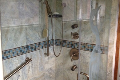 Mid-sized transitional 3/4 multicolored tile and porcelain tile alcove shower photo in Other with recessed-panel cabinets, dark wood cabinets, a drop-in sink, quartz countertops and a hinged shower door