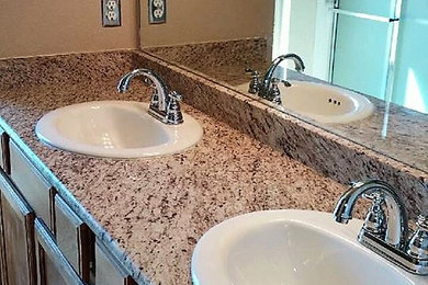 Bathroom photo in Denver with granite countertops