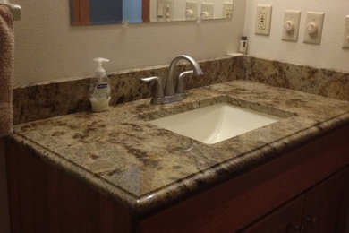 Bathroom - bathroom idea in Other with an undermount sink and granite countertops