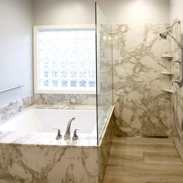 Gray Bathroom w/ White Alabaster Cultured Marble Countertops and Tyverian Shower