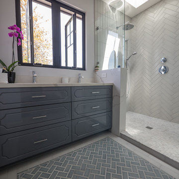 Gray Herringbone Tiles Bathroom with Tile Rug