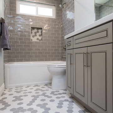 Gray tones playfulness. A kids bathroom in Oak park.