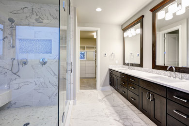Inspiration for a large modern master white tile and porcelain tile ceramic tile and white floor bathroom remodel in DC Metro with shaker cabinets, dark wood cabinets, a two-piece toilet, white walls, an undermount sink, quartz countertops, a hinged shower door and white countertops