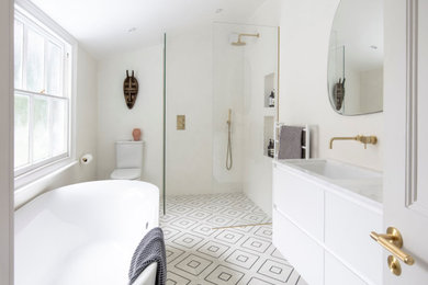 Photo of a contemporary bathroom with white walls.