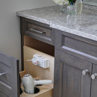 Bathroom - mid-sized transitional master gray tile and porcelain tile porcelain tile bathroom idea in Chicago with shaker cabinets, dark wood cabinets, a two-piece toilet, gray walls, an undermount sink and quartz countertops