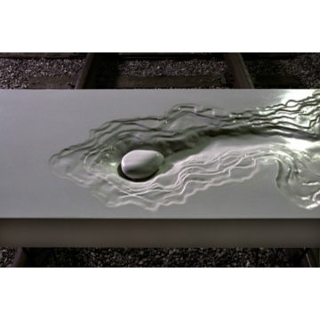 Grey Concrete Erosion Sink with Stone Drain Cover- Original Design by Brandon Go