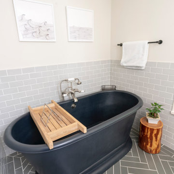 Grey Subway Tile and Herringbone Bathroom