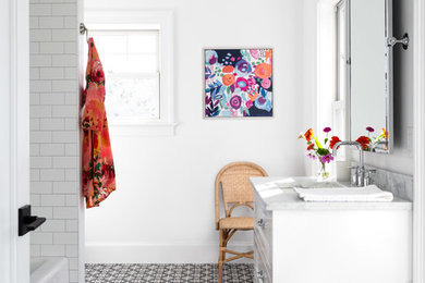 Inspiration for a mid-sized transitional kids' bathroom remodel in Other with marble countertops