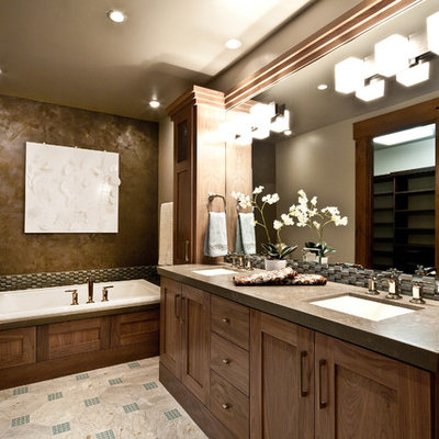 Trendy mosaic tile drop-in bathtub photo in Salt Lake City with an undermount sink, shaker cabinets, dark wood cabinets and brown countertops