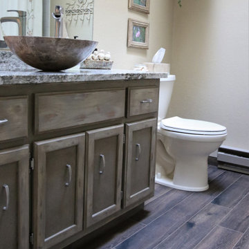 Guest Bathr Remodel with Granite Countertops and Wood Plank Flooring
