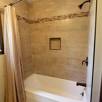 Guest bathroom beige tile tub area ~ Medina, OH