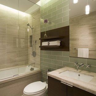 Inspiration for a mid-sized contemporary bathroom remodel in Chicago with an undermount sink, dark wood cabinets, a one-piece toilet and gray walls