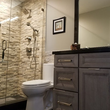 Guest Bathroom Full Remodel Featuring Custom Cherry Cabinetry, Granite Tops