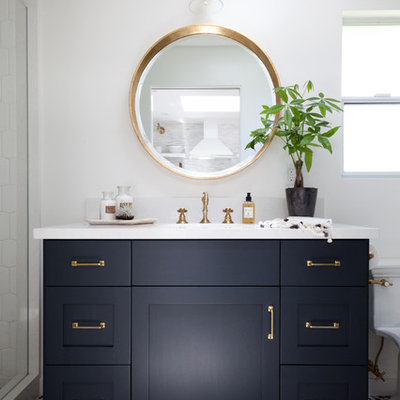 Inspiration for a mid-sized coastal multicolored tile bathroom remodel in Los Angeles with black cabinets, marble countertops, white walls, a console sink and shaker cabinets