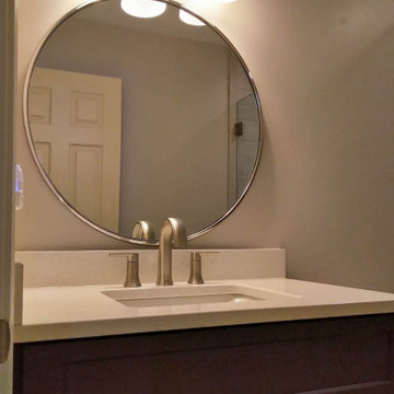 Guest Bathroom with Maple Wood Graphite Tinted Vanity and Quartz Countertop
