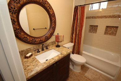 Example of a mountain style bathroom design in San Diego with an undermount sink